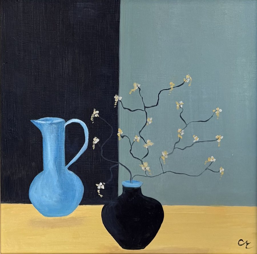 Blue Jug and Blossom — framed oil on board by Charlotte Miller, a pale blue jug and a black vase of thin blossom branches against dark and grey-green panels above a yellow table