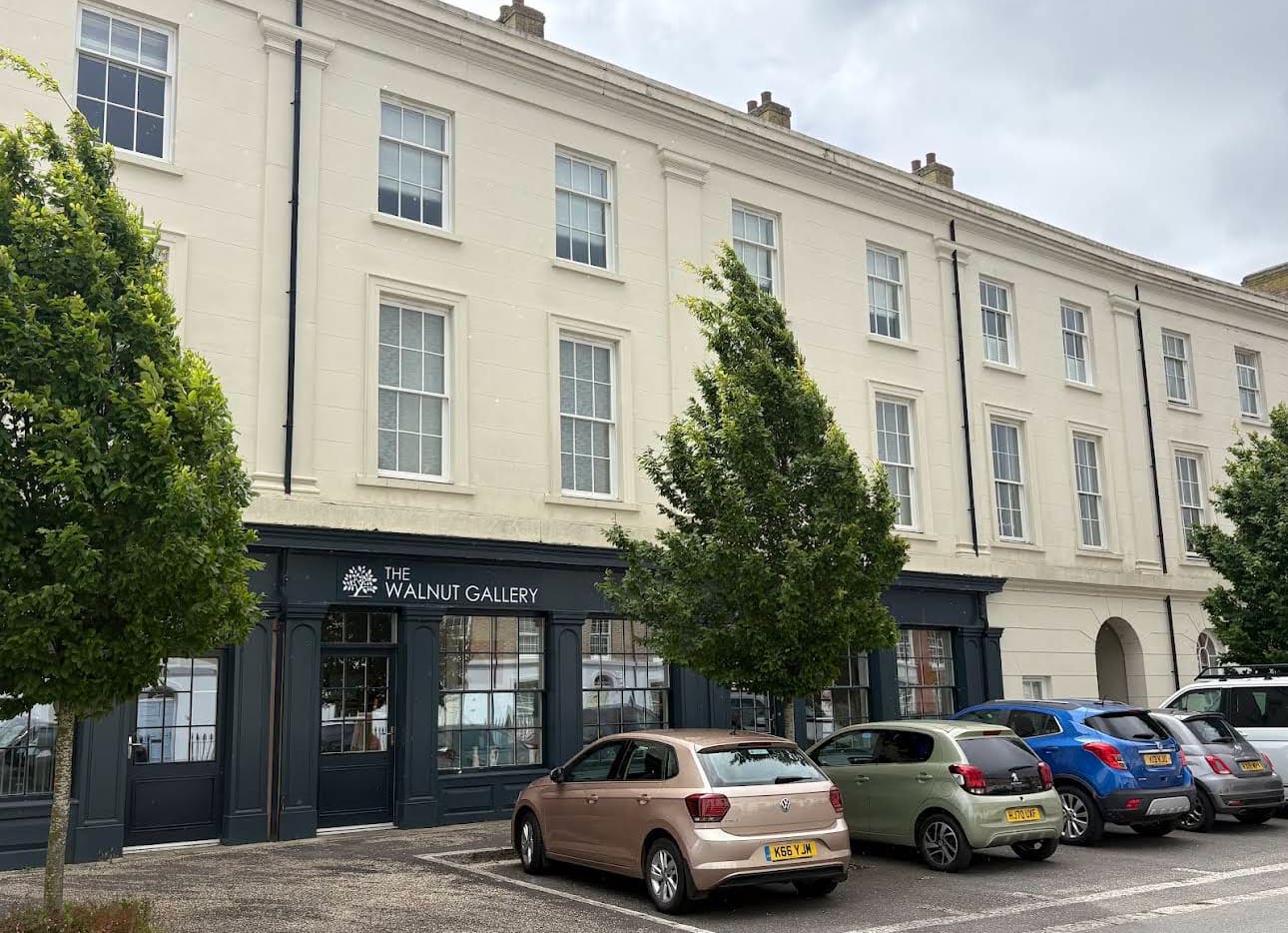 Crown Street West, Poundbury — leafy street with easy on-street parking outside The Walnut Gallery